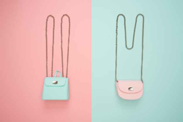 photo of two teal and pink leather crossbody bags